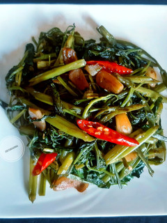 A picture of Kang Kao Stir Fried - Kalmi Saag/ Morning Glory/ Water Spinach.