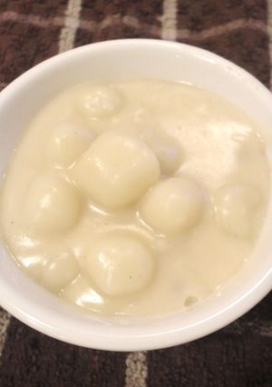 A picture of Paal Kolukattai (Steamed Rice balls in Coconut Milk).