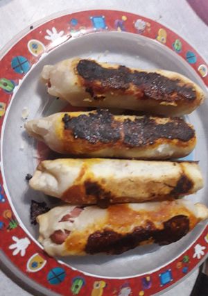 Una foto de Salchichas envueltas gratinadas