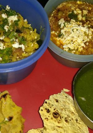 A picture of Leftover Rice briyani and mix Soyabean veg subji with paratha.