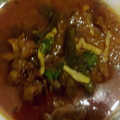 A picture of Mutton curry in pressre cooker.