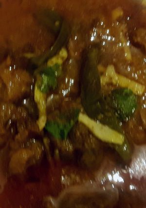 A picture of Mutton curry in pressre cooker.