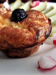 Une photo de Mini quiches sans pâte aux champignons, poireau, lardons.
