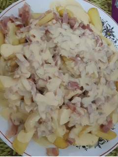 Una foto de Patatas bacon cheddar