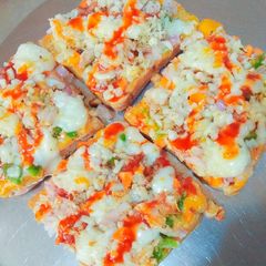 A picture of Open Bread pizza.
