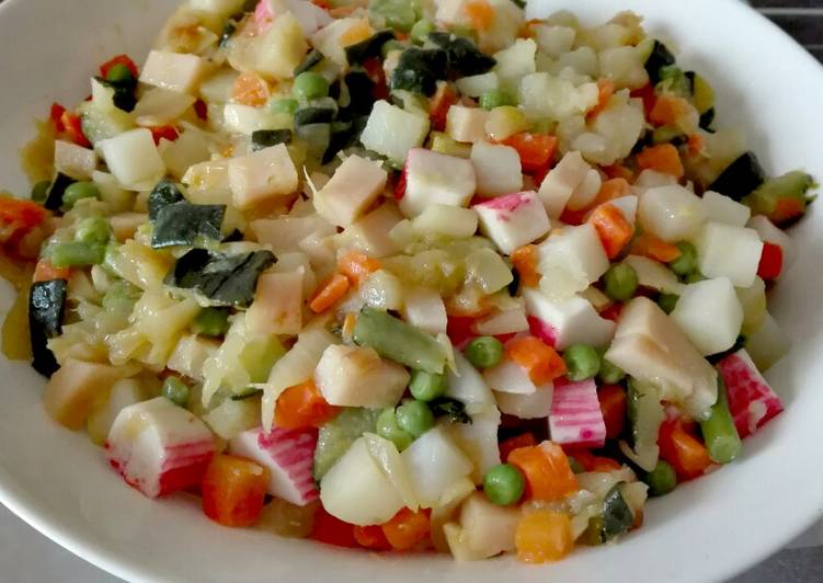 Jardinera de verduras con guisantes y calabacín