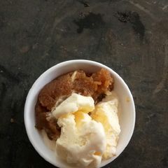 A picture of Ice cream with moong dal halwa.