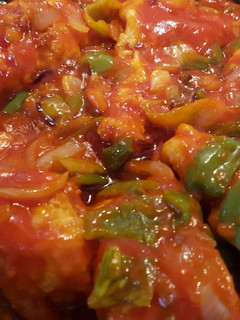Una foto de Bacalao con tomate