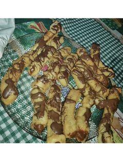 Una foto de Churros con chocolate rellenos de dulce de leche 😎