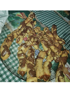 Una foto de Churros con chocolate rellenos de dulce de leche 😎