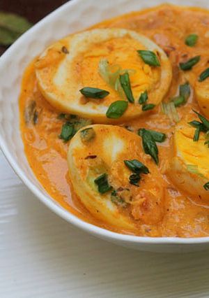 A picture of Eggs in Fruity, Creamy Curry Sauce.