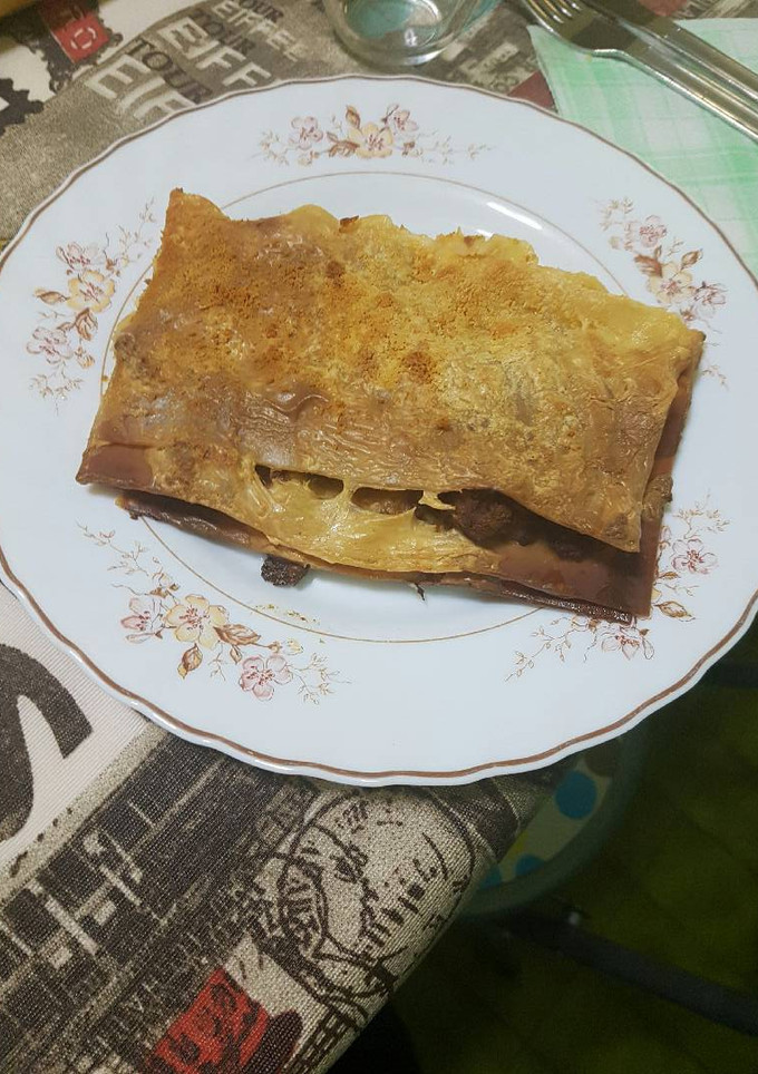 Una foto de Lasaña con carne