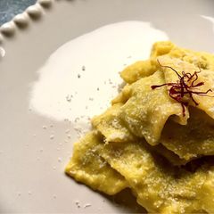 A picture of Maltagliati with creamy saffron leeks and pecorino.