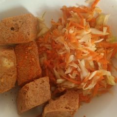 A picture of Soya bean tufu with veggies.