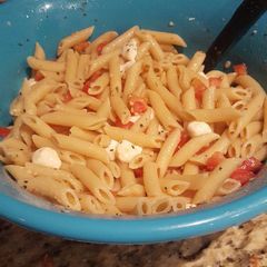 A picture of Tomato and mozzarella penne pasta.