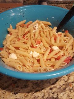 A picture of Tomato and mozzarella penne pasta.