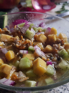 Una foto de Aperitivo de Berberechos con Mango