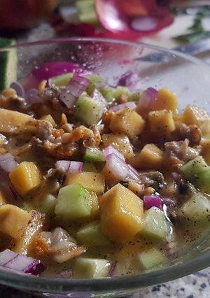 Una foto de Aperitivo de Berberechos con Mango