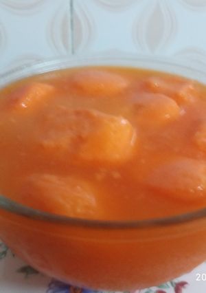 A picture of Komola Bhog - orange flavoured Roshogolla/Rasgulla.