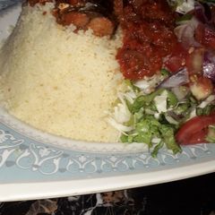 A picture of Buskin couscous and stew.
