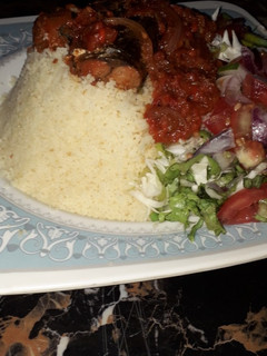 A picture of Buskin couscous and stew.