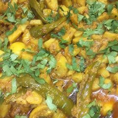 A picture of Spicy achari alu.