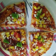 A picture of Corn pizza.