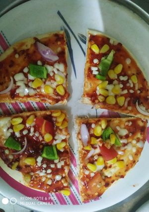 A picture of Corn pizza.