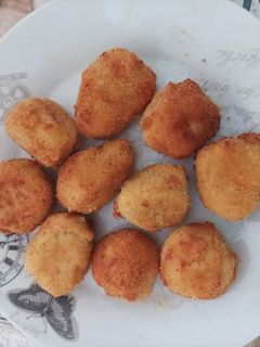 Una foto de Bocaditos de calabacín y queso