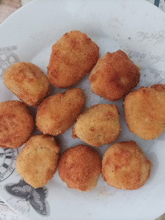 Una foto de Bocaditos de calabacín y queso