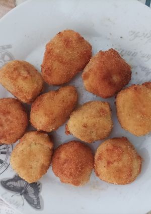 Una foto de Bocaditos de calabacín y queso