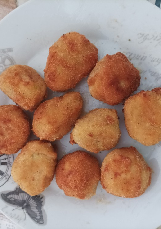 Una foto de Bocaditos de calabacín y queso
