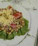 Atún con pimientos y salsa holandesa