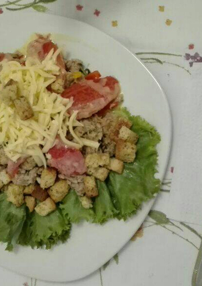 Una foto de Atún con pimientos y salsa holandesa
