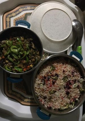 A picture of Vegetable Sauce with fried Rice.