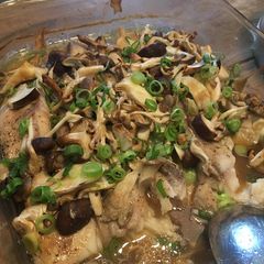 A picture of Tilapia with mushrooms.