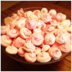 A picture of Home made meringue kisses.