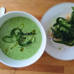 A picture of Green Gazpacho with Cucumber Bruschetta.