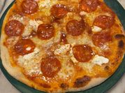 Una foto di pizza alla ricotta