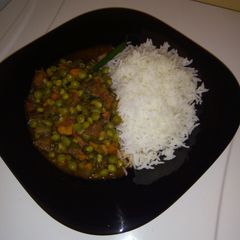 A picture of Rice and peas stew.