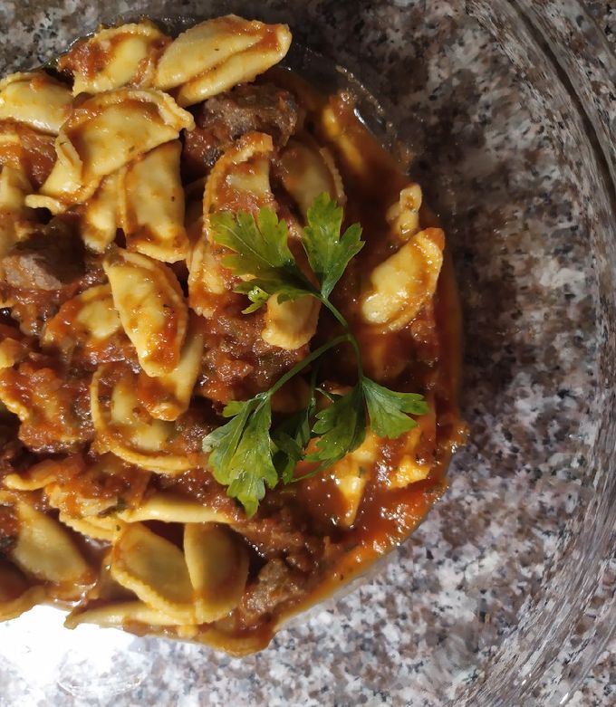 Una foto de Tortellini con tuco