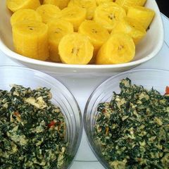A picture of Boiled plantain with mashed sardine,egg and vegetable.