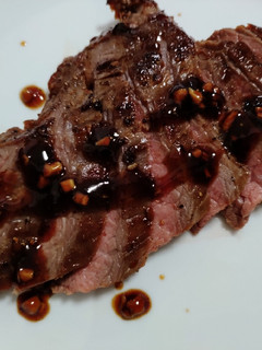 A picture of Soy and sweet chili glazed flank steak.