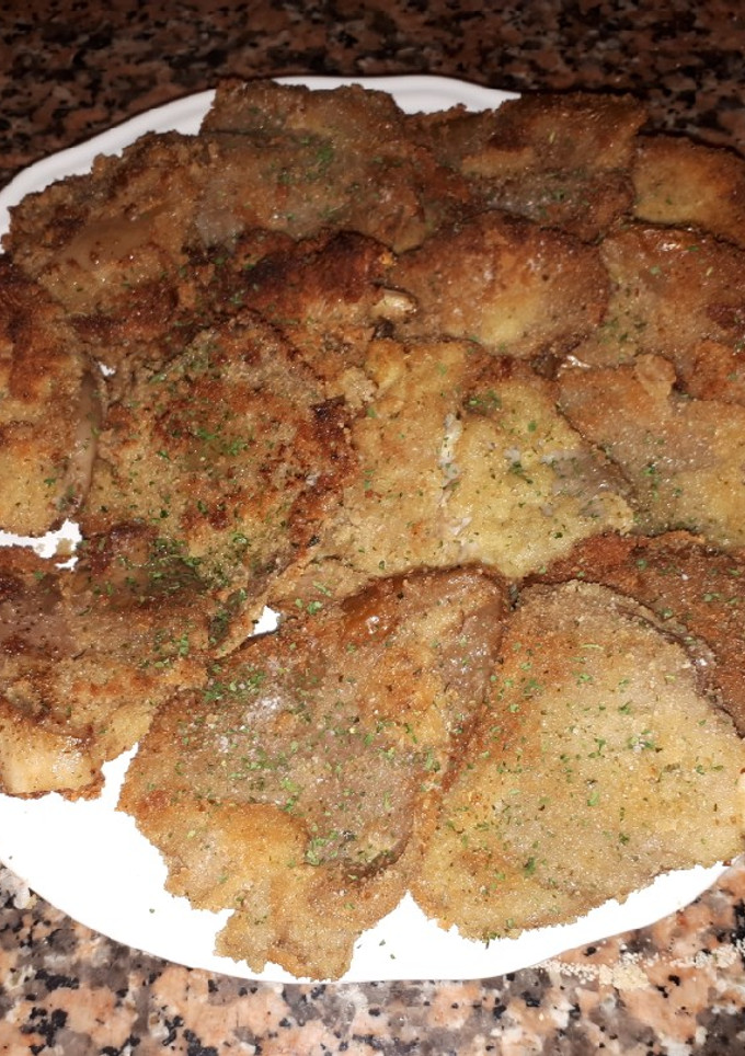 Una foto de Setas empanadas al ajillo