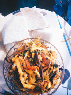 A picture of Cabbage sauce and boiled yam.