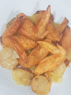 Una foto de Alitas al horno con vino