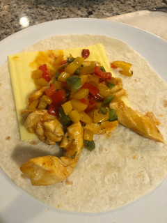 Una foto de Fajitas de pollo y pimientos