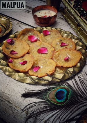 માલપુઆ (Malpua Recipe In Gujarati) રેસીપી મુખ્ય ફોટો