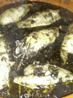 Una foto de Calamares rellenos en su tinta