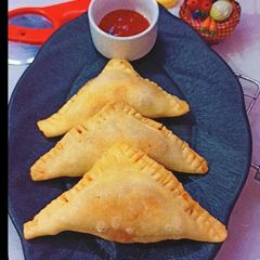 A picture of Cheesy Corn triangles.